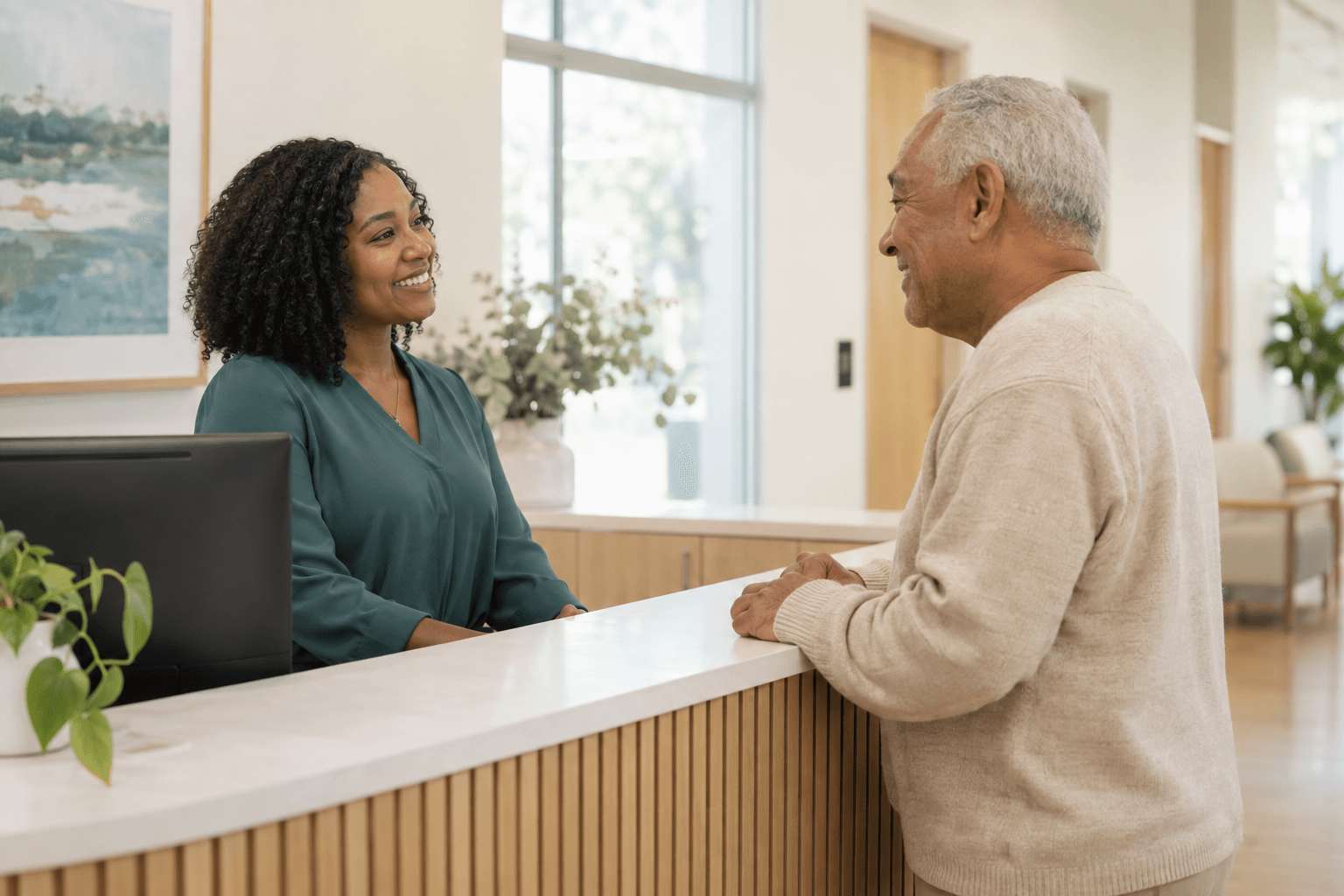 A clinician reading a chart before a visit.
